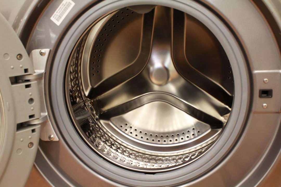 滚筒洗衣机的过滤网的前板怎么打开-滚筒洗衣机的过滤网清洗